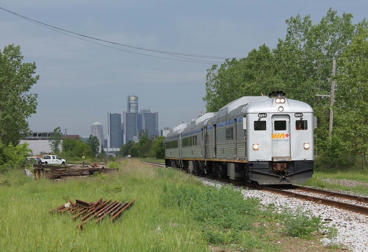 Back in May Windsor hosted the Memorial Cup which our Spitfires ended up winning. During the tournament VIA took school students to and from the WFCU Center while giving them lessons on rail safety. This was the first time since the 1980s that VIA RDCs were in Windsor. This was one of the first runs for the week they were down here and the weather wasn't very cooperative. In the background you can see the ominous sky over the Detroit skyline.
