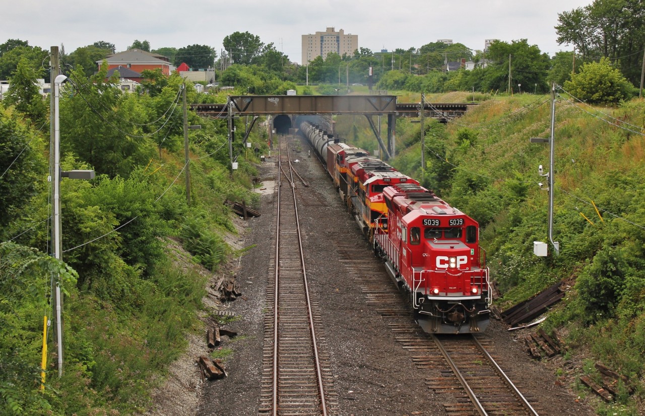 CP 650 with a colourfull consist comes screaming out of the Detroit River tunnel in Windsor, ON.