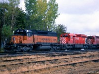 Three SD40's head up this westbound freight flying white flags, all facing forward "elephant style": Milwaukee Road SD40-2 209 (soon to be patched and renumbered for owner SOO Line as their 6370), and CP 5402 & 5400, both ex-Quebec, North Shore and Labrador 200-series SD40's that CP had acquired a group of (note the extended fuel tanks and snow shields behind the cab on 5402).