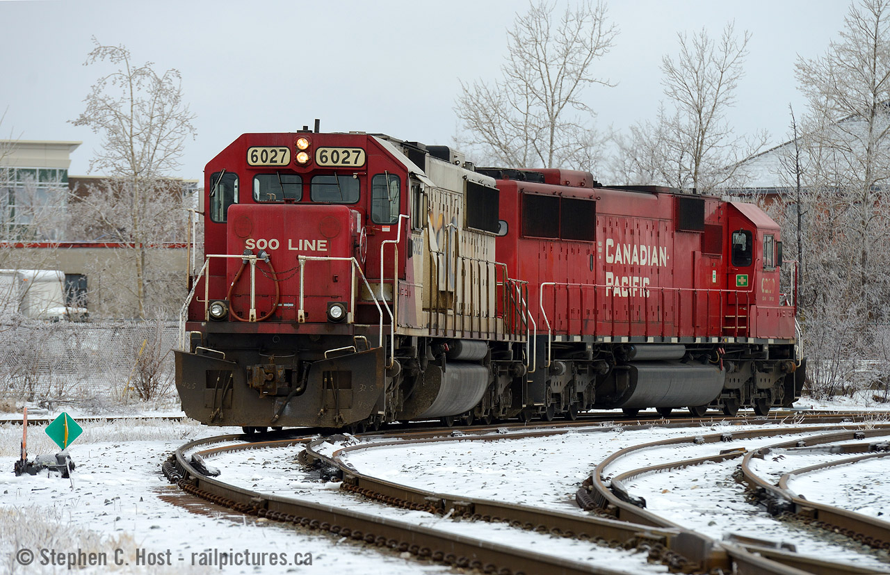 Brrrrrrrrrrr.. remember cold? I don't, but maybe this will rekindle your memory. SOO 6027 seen on the wye at Galt turning to head back west to Wolverton on this very cold late March day. Nice to see a pair of SD60's (one rebuilt, one not) side by side. I don't think any SOO SD60's are roaming any longer.