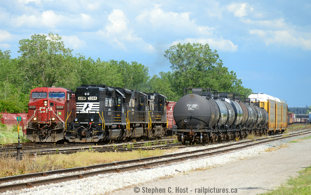 And a second photo from June 25 25th when I had the luck to capture a meet between NS C93 and CP 255 on the CN Stamford Subdivision (Whew). Fort Erie's neat because although the track is owned by CN, the majority of trains aren't CN (and this has been the case for a very long time!). From what I can tell, CP runs 6 per day, CN 4 per day, and NS two (counting both directions). Contrast this to what happens just across the border and it's any wonder people spend any time in Fort Erie. I had no time to cross (just one hour to get any trains) and my timing was impeccable.