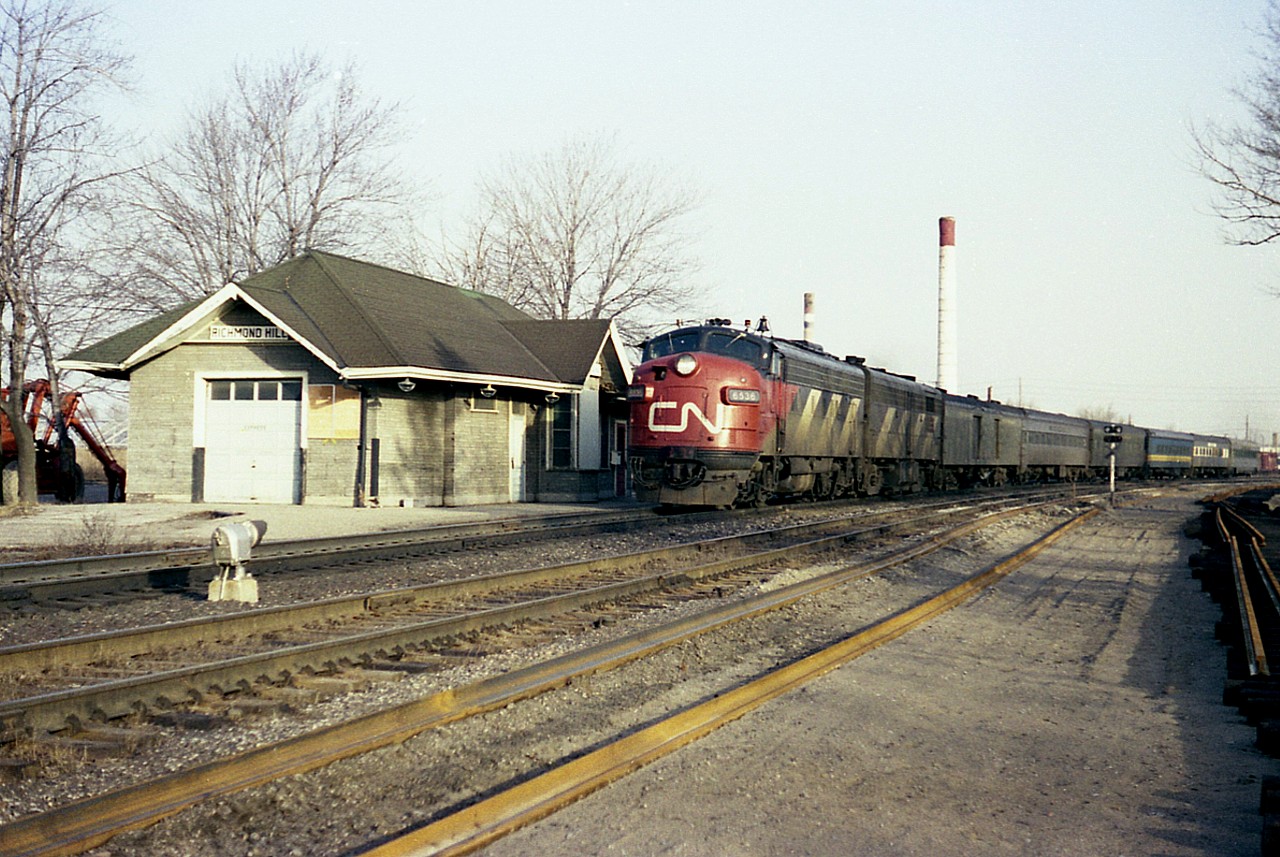 This is the southbound ONR-CN passenger train that ran prior to the ONR getting the infamous TEE train sets. I believe they alternated CN and ONR head end power. On this day, CN 6536 and an unknown B unit pass the old Richmond Hill station. Note the new arrival of welded rail. And the station was moved in the early 1980s to Elgin Mills Rd to become a senior centre. Its current status I do not know, but assume it is still standing.