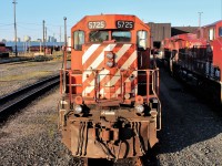 One last look at the front end of a well weathered and traveled SD40-2 in the early morning sunshine.