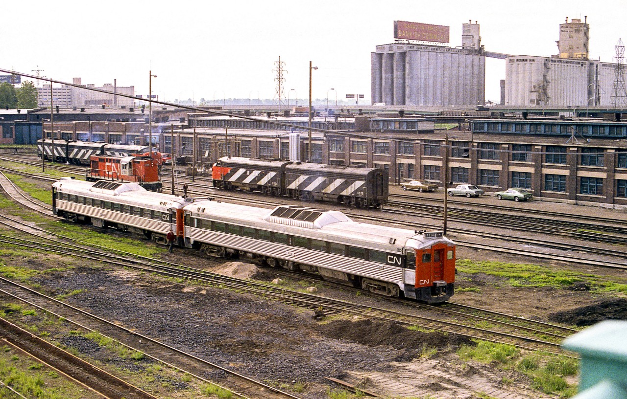 It was a cloudy mid-June day in 1972 (The date given is as close as I can remember.), and I had my dad's Nikon which still had his roll of color print film in it. I was on the Spadina Avenue bridge looking down into the CN engine facility. Little did I know how much this area would change over the years.