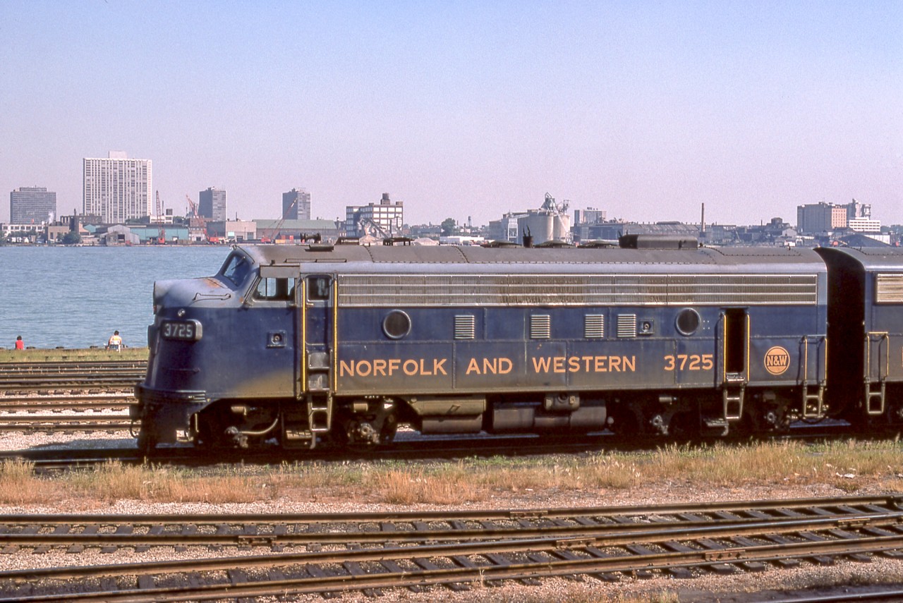 N&W 3725 is sitting in the CN Windsor yard on the early morning of July 6, 1974. The city of Detroit is in the background.