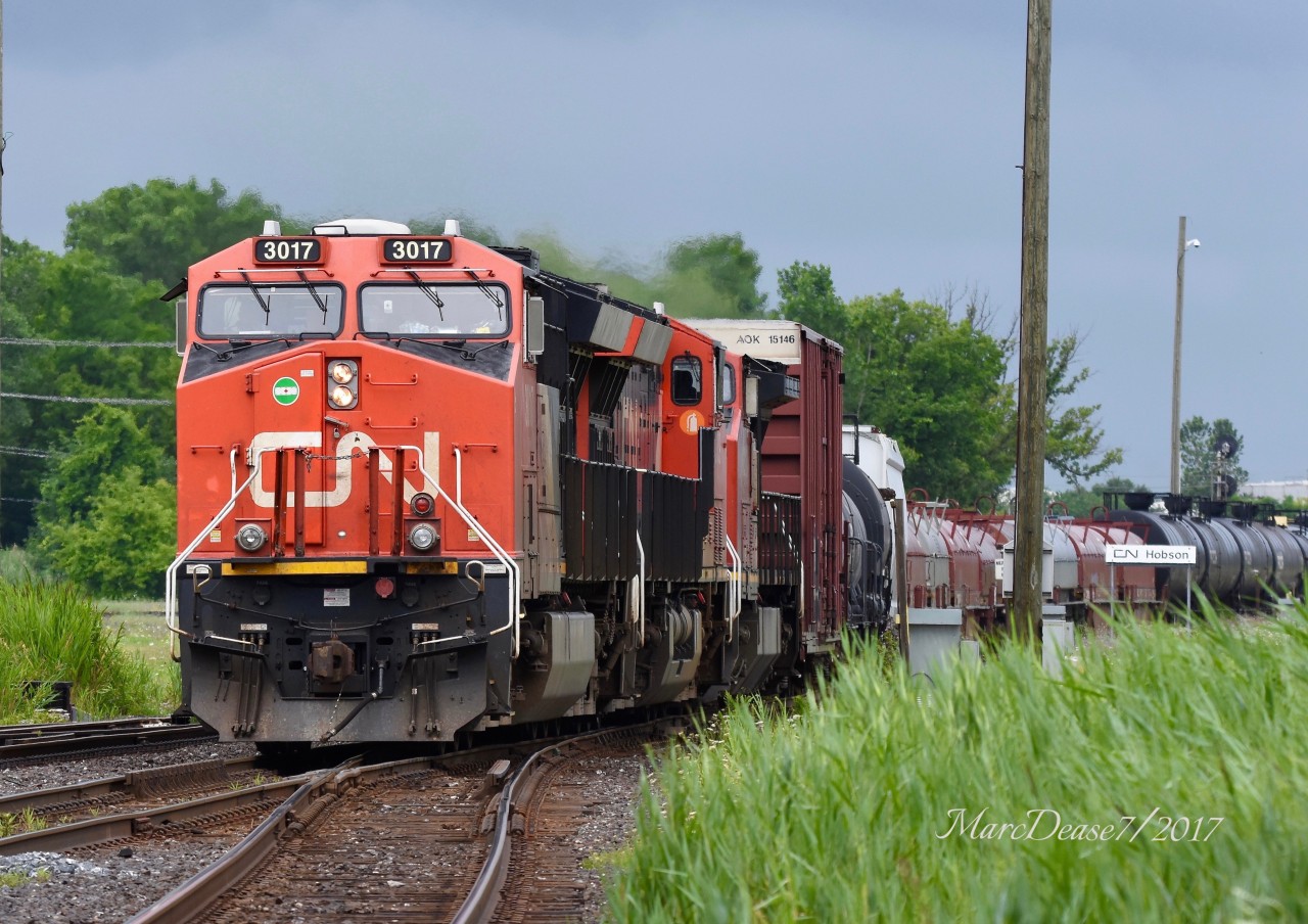Train 394 rolls by Hobson into Sarnia with CN 3017, CN 3109 and CN 2164.