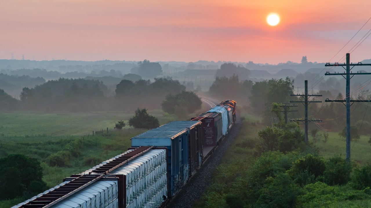 CN 2234 heads east through the early morning fog in Newtonville.
