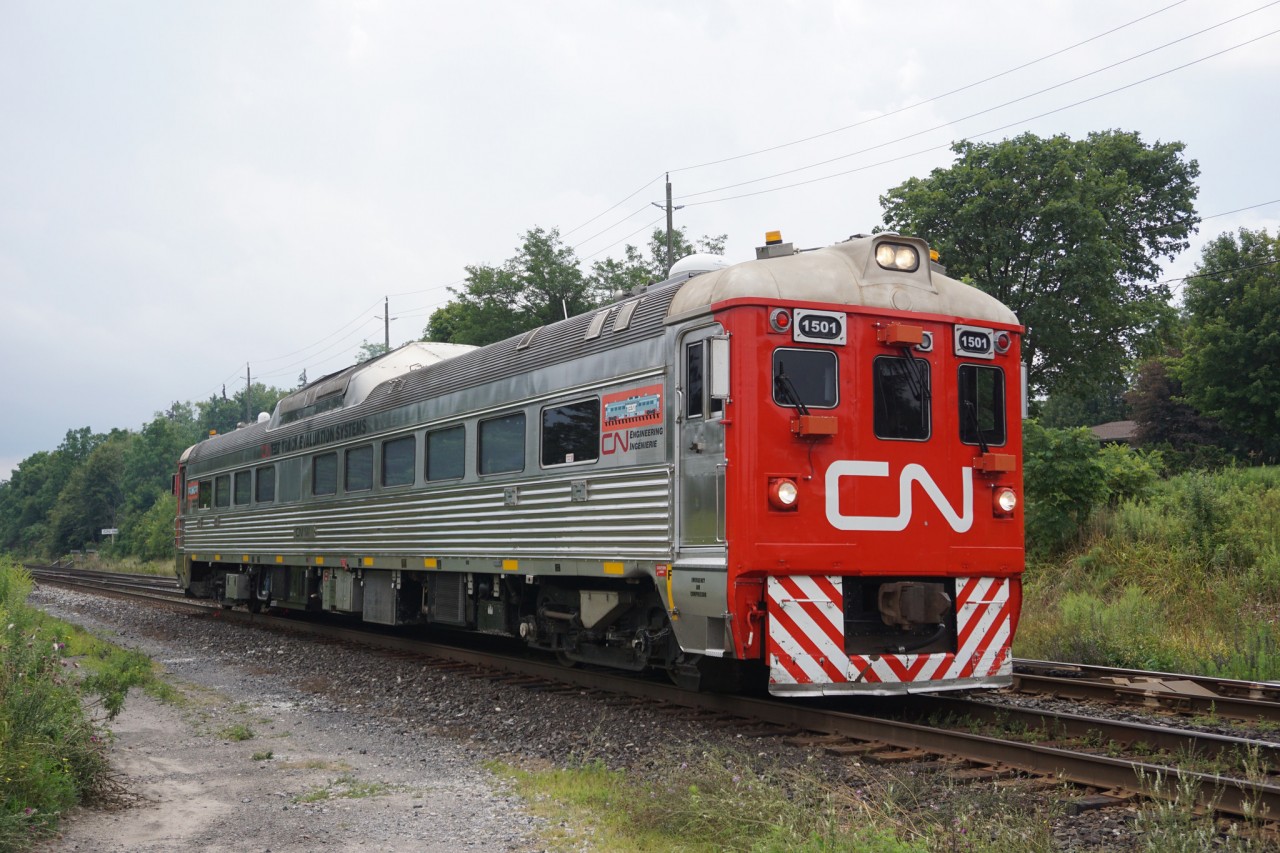 CN 1501 rolling through Hardy after waiting for 385 to finish up work at Paris.