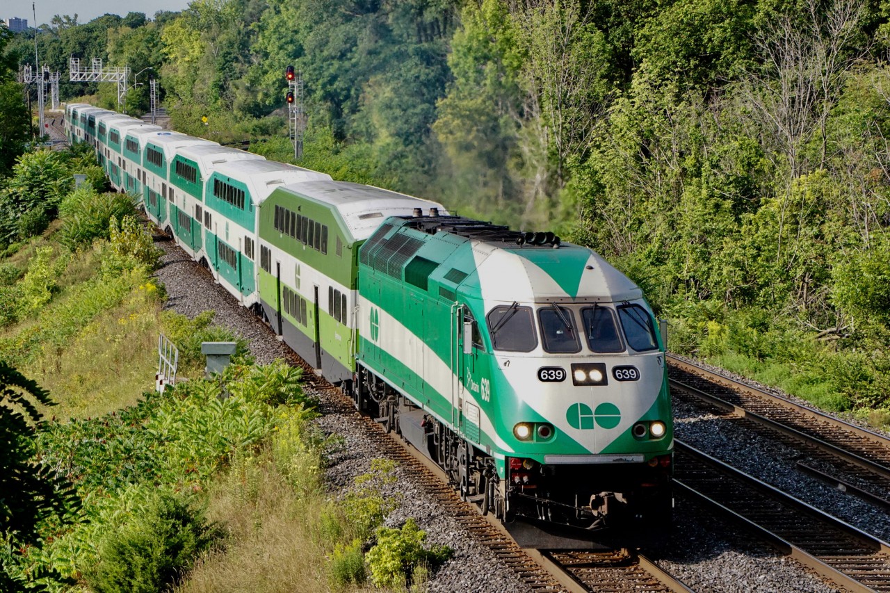 On a sunny Saturday morning GO 639 leads an eastbound GO Train out of Hamilton as it passes Bayview Junction.