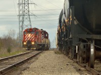 After shoving some tanks from AOC Resins and pulling cars from PDI behind them, the crew of TG14 had tied the tanks down on the main just north of the wye, then run their power around the wye to lift the tanks (seen here) and add them to the head end of the train.