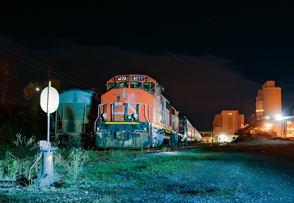We pause for a few minutes after dropping 36 cars (18 cars per drop) at Holcim. The use of a police flashlight really helps to paint the scene.