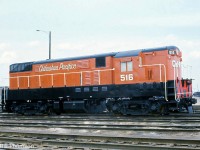Chihuahua Pacifico FM H16-44 516 sits at CN's MacMillan (Toronto) Yard in fresh paint in April 1974, likely on its way back to Mexico. 516 was part of a group of H16-44's CHP had rebuilt by United Railway Supply in Carterville, Quebec in the early 70's. Some units were high hood, others CHP had already given oddball chop-nose jobs.
