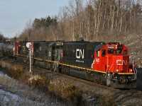 CN 435 rolls by the approach signal to Mansewood on a lovely February afternoon with CN 5420, IC 1025 and CN 2154 providing the horsepower on this 124 car train.
