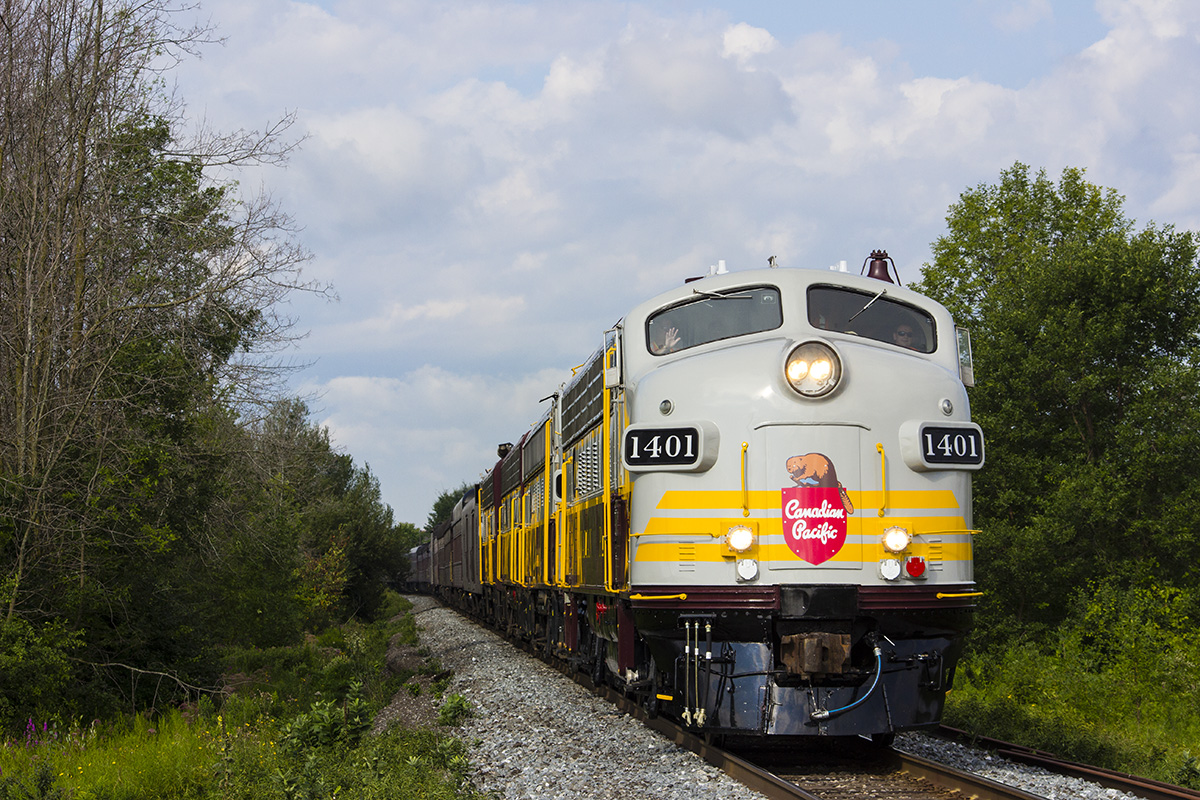 After the festivities were all done in Toronto, it was time to head off to their next destination, Montreal. CP's Canada 150 train departed first thing next morning and is making haste on the CP Belleville Sub. The engineer also gave a friendly wave as it passed by.
