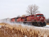 CP train 422 kicks up snow as it is seen leaving Windsor bound for Toronto behind CP 8539, large multimark SD40-2 5863 and CP 5767. The next day couple of days 5863 would lead this train out of Windsor.