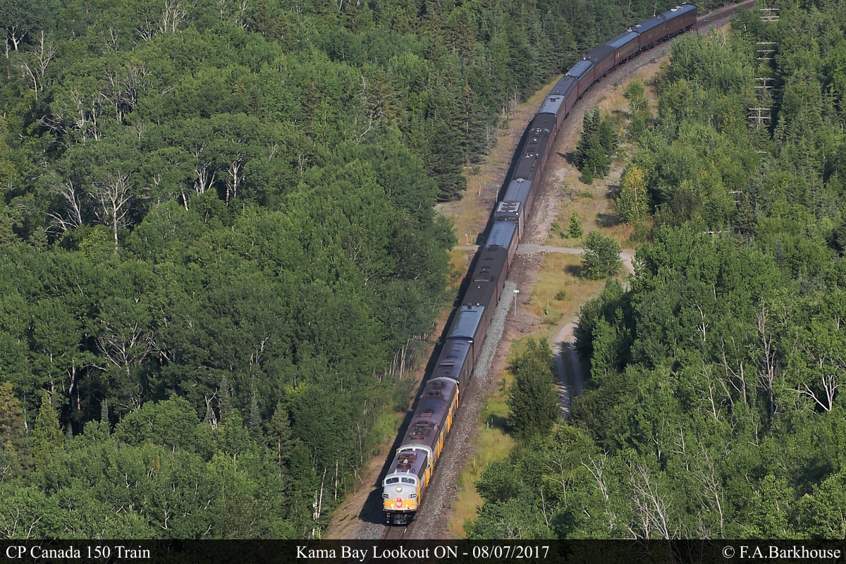 Looking down on the CP Canada 150 train as it traces along the north shore of lake superior from Kama Bay Lookout.