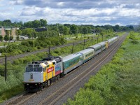 For what may be a first time, a VIA Rail train (VIA 633) has three wrapped units (albeit split up), with VIA 6437 up front, VIA 900 mid-train and VIA 912 bringing up the rear as it heads west through Pointe-Claire.