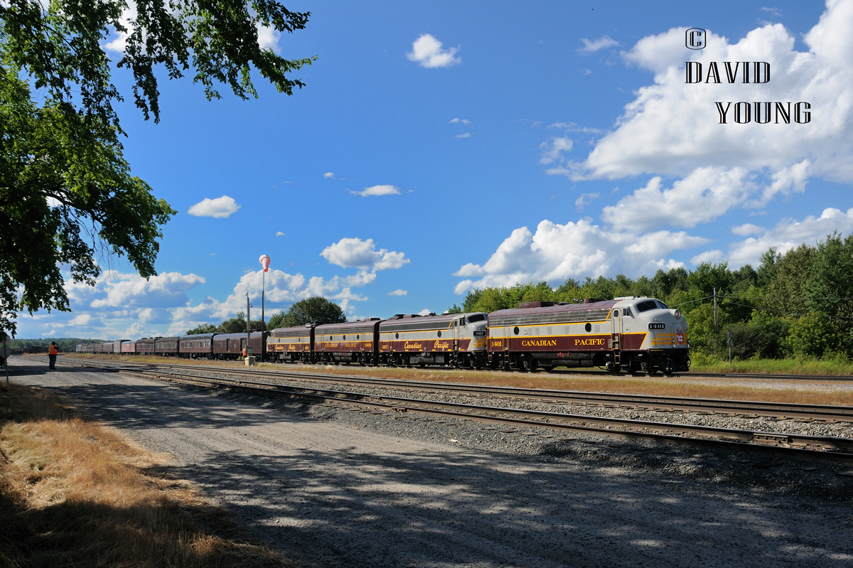 After a crew change, the Kam Sub crew pulls down the Canada 150 train to load a few privileged people onto the train for the trip eastward. Note the empty space between the mainlines here, this was where the old depot in Ignace use to be, before it was torn down.