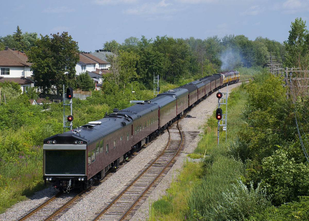 Theatre car CP 1 brings up the rear of part of the CP 150 train. After setting off two string of cars on two tracks, the train is leaving Ottawa Station with nine cars just before the CP 150 show begins. That part of the train will lay over at nearby Walkley Yard until the show ends, presumably there was not enough room for the whole train to stay at the station the entire afternoon.