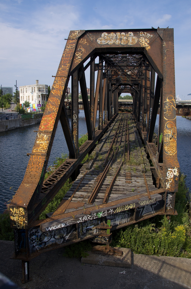 This swing bridge used to allow CN freight trains to cross the Lachine Canal but has been out of use approximately a quarter of a century.