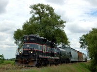 In a scene inspired from John Hardy's <I> Rusty Rails</I>, I captured the ol' <I>"Pride of Orangeville"</I> and crew returning to Orangeville north of Snelgrove, approaching Old School Road. In Mr. Hardy's book he captured a pair of CP MLW's along with a leased VIA F40PH-2 6452 leading a caboose hop north on the then CP Owen Sound Sub in late December 1994. The book is a great read for anyone wishing to learn more about the the branches in mid-western Ontario, from construction to abandonment.