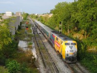 VIA 87 slows down for his station stop in Kitchener as it clears the Kitchener mile board.