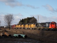 it's not very often these days one can catch a solid consist of standard cabs but this day proved to be rewarding. Here we see a fresh looking SD60 5421 (ex Oakway Leasing) leading IC SD70 1020 and five ex UP Dash-8s heading to Toronto for storage, where eventually they well emerged in CN paint. The train is passing Mississauga Road and as luck would have it I just beat a cloud overhead to get this shot :)