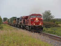 East bound approaching Trenton, 5 units, 5 different paint schemes. unaware and out of place for a nicer shot. As CP 6034 is off to destinations unknown.
