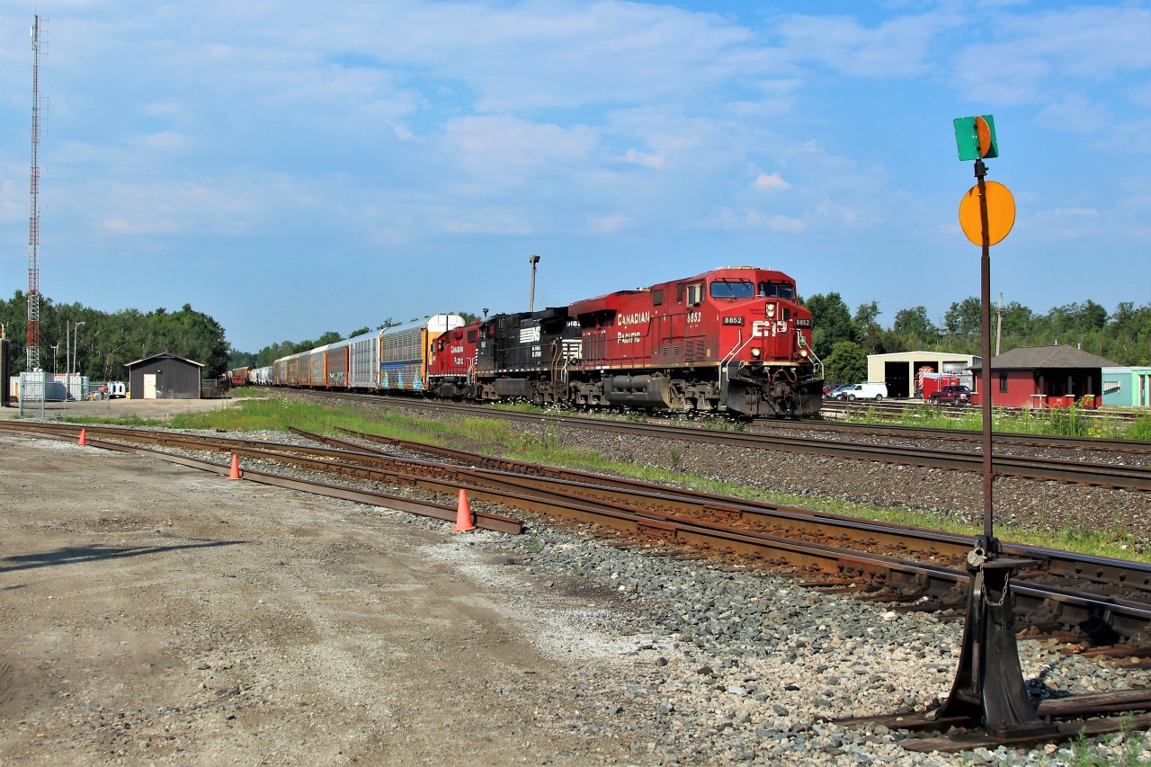 Todays CP 140-01 is lead through Guelph Junction by CP 8852 with NS 9182 and CP 3037 for power hauling 5152 feet of assorted cars.