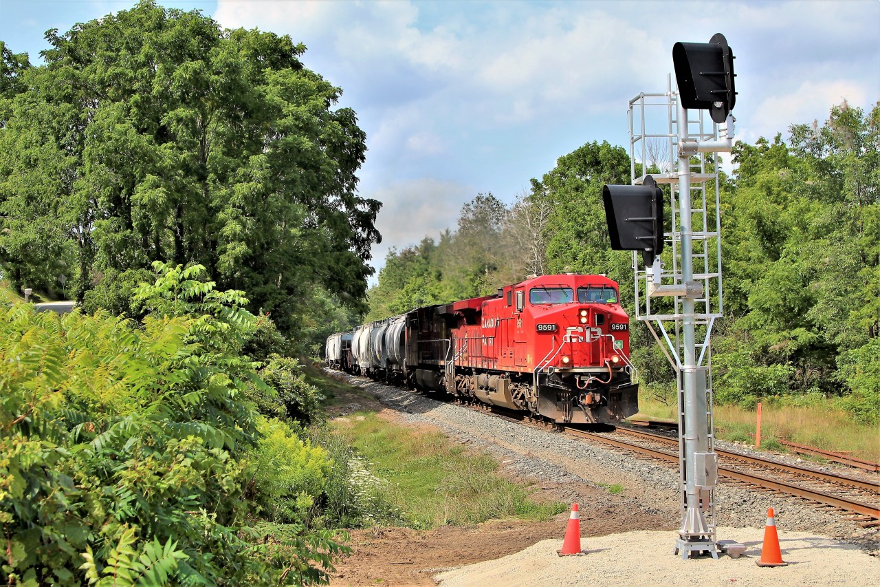 What a change a few days make. One of my favourite locations has undergone a major facelift as the new signals are now installed for northbound trains headed to the "Y" at Guelph Junction. Here, CP 254 heads south on its way to Desjardins.