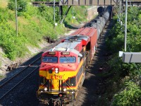 KCS 4803 lead's CP 650 out of the tunnel and into Canada.