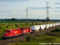The first? Rebuilt SD40-2 released from CAD in Montreal in the new beaver scheme makes it's maiden voyage on the eastbound Expressway out of Milton tonight. It's pleasing to see SD40-2's get a new lease on life. According to reports, this is supposed to be a SD40-3 but it's labelled, right now, on the side of the unit as a "SD30C-ECO DRF-30aa". I'll let the loconotes guys debate what any of this means :) I'm more curious to what power plant is inside this... a 710 or a 645..
