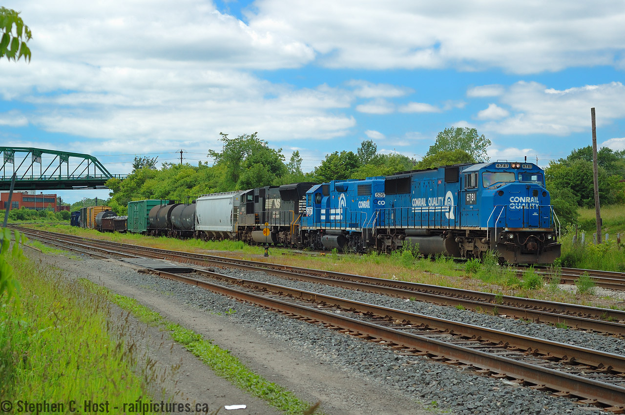 After meeting NS 327 at Duff an hour earlier, NS 369 is preparing to depart Fort Erie with 94 cars with a pair of ex Conrail engines in the lead. I'm amazed how fast Conrail paint was eliminated by NS shop forces making me miss these blue things even though I found them awfully common at the time.

And an interesting anecdote I observed on this day, when crews called the NG dispatcher entering the US they identified as "Wabash" trains. A real throwback as the Wabash name was still used on CSX's dispatcher display, despite having been merged into the N&W in 1964.