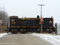 After Bill Thomson's post of the <A href=http://www.railpictures.ca/?attachment_id=30464 target=_blank>CN Display in Lindsay</a> and since I have seen very few colour photos of CN's early diesel scheme - A light blinked in my 'ol brain and now I realise where Trillium's scheme, above, is inspired from. Interesting.. to say the least. Anyone have colour photos of this CN scheme in service? Please share :)<br><br>
On one of my few trips to Trillium, the crew is busy shuffling Ethanol cars in WH Yard near Dain City and mother nature is ANGRY. I was in town only an hour - that's it, and I managed to shoot the <a href=http://www.railpictures.ca/?attachment_id=27476 target=_blank>Resolute Forest Products  switcher in Allanburg</a> 40 minutes earlier in beautiful sun, what you see is a snowsquall seconds away form obliterating any view I thought I had - the further south I went, the angrier things got and it got so dark I could only pull off something with really low shutter speed, so I tried a pan - then the snow flied. I quickly turned back north to head toward Hamilton (and the sun) to get my wife, on the way along HWY 140 I managed to find the former Stelco (Atlas Steel) switcher at Welland Pipe (photo to come later). a really lucky short trip to Niagara. I remember my two winter Trillium trips in 2002/2003 which resulted in not much action - I did manage to get TR 110 on Film though - but that's it - this trip helped make up for it :)


