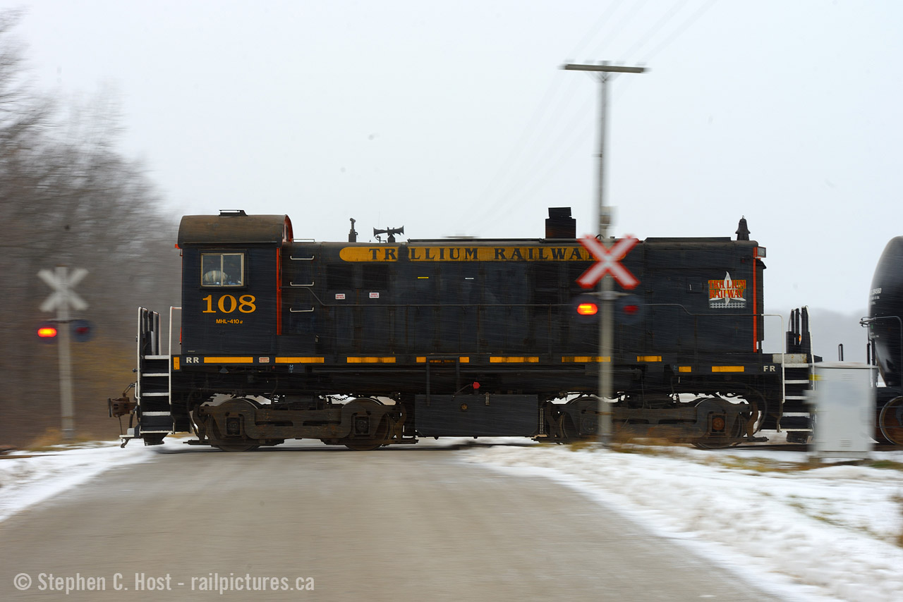 After Bill Thomson's post of the CN Display in Lindsay and since I have seen very few colour photos of CN's early diesel scheme - A light blinked in my 'ol brain and now I realise where Trillium's scheme, above, is inspired from. Interesting.. to say the least. Anyone have colour photos of this CN scheme in service? Please share :)
On one of my few trips to Trillium, the crew is busy shuffling Ethanol cars in WH Yard near Dain City and mother nature is ANGRY. I was in town only an hour - that's it, and I managed to shoot the Resolute Forest Products  switcher in Allanburg 40 minutes earlier in beautiful sun, what you see is a snowsquall seconds away form obliterating any view I thought I had - the further south I went, the angrier things got and it got so dark I could only pull off something with really low shutter speed, so I tried a pan - then the snow flied. I quickly turned back north to head toward Hamilton (and the sun) to get my wife, on the way along HWY 140 I managed to find the former Stelco (Atlas Steel) switcher at Welland Pipe (photo to come later). a really lucky short trip to Niagara. I remember my two winter Trillium trips in 2002/2003 which resulted in not much action - I did manage to get TR 110 on Film though - but that's it - this trip helped make up for it :)