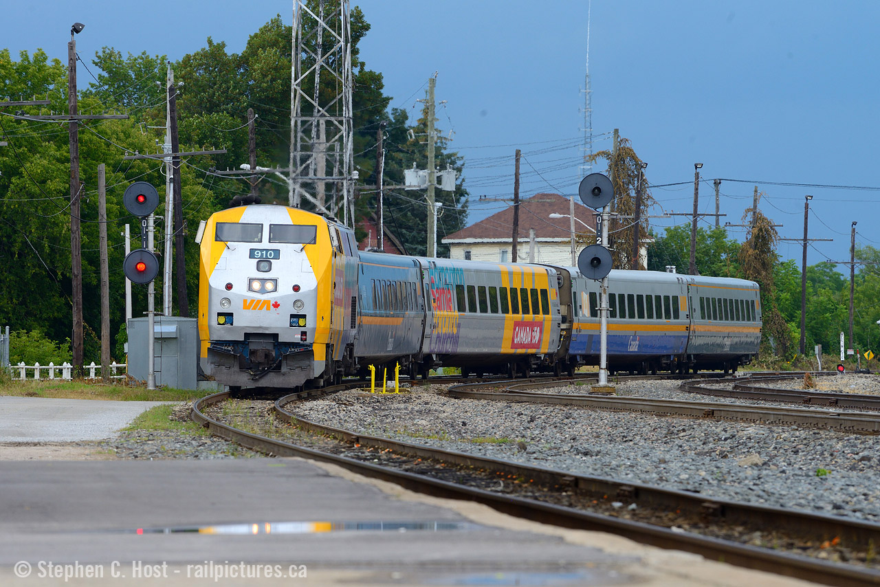 Under threatening skies, VIA train 645 enters the CP Belleville Subdivision crossing over to the Brockville Subdivision toward Toronto, sadly trains no longer stop at the Smiths Falls CP station instead stopping at a shack north of town, if they stop at all.