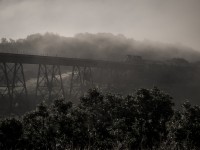 CN crossing Westbound on the Uno viaduct in an early morning mist. 