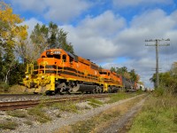 <b>Westbound Workhorses.</b>. I believe this was one of the last trips on 432/431 for CN SD75i 5800 last fall before being returned from lease.  Here an overpowered 431 (33 cars) is speeding out of Guelph at Hanlon.
