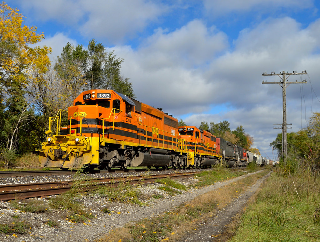Westbound Workhorses.. I believe this was one of the last trips on 432/431 for CN SD75i 5800 last fall before being returned from lease.  Here an overpowered 431 (33 cars) is speeding out of Guelph at Hanlon.