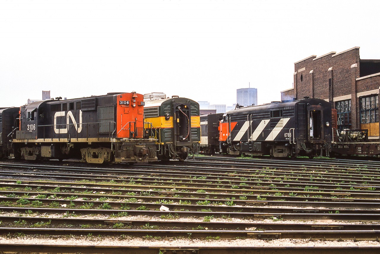 It is a hazy mid-June 1972 day in Toronto at the CN Spadina engine facility.
