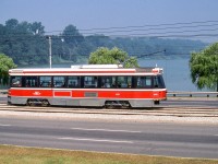 TTC 4082 passes a lake on August 12, 1988. Whether TTC streetcars are in the heart of the city or in a attractive scene such as this one, they can capture the heart of a transit lover.