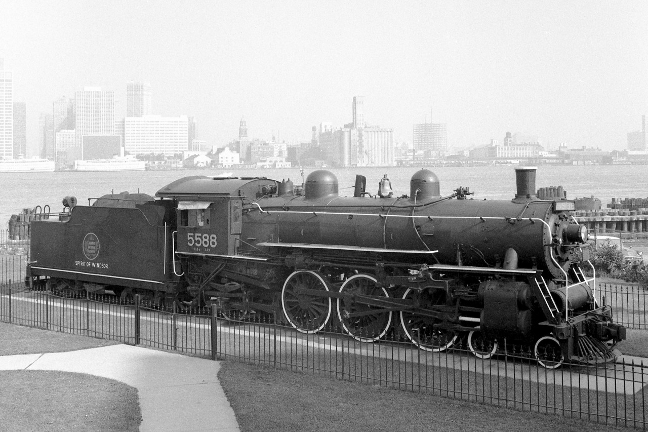 This image of CN 5588 "Spirit of Windsor" was taken in the late 1960's or early 1970's. That is Detroit, Michigan in the background.
Sadly I doubt she looks so good nearly a half century later.