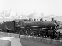 This image of CN 5588 "Spirit of Windsor" was taken in the late 1960's or early 1970's. That is Detroit, Michigan in the background.
Sadly I doubt she looks so good nearly a half century later.