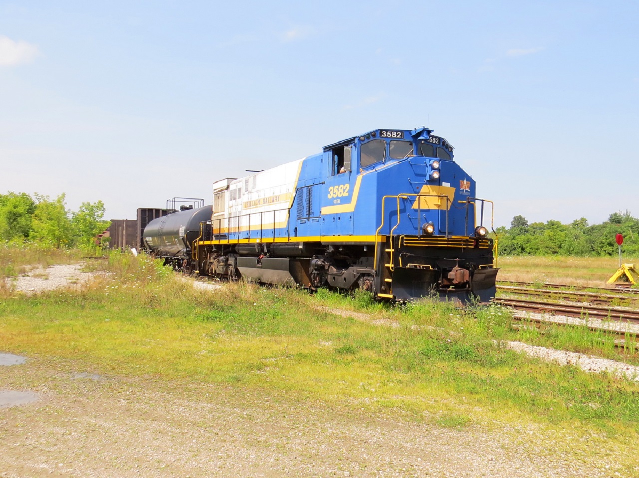 Relatively young at the time, photography wise, I was able to catch STER pick up some cars presumably from CN to bring to Tillsonburg. I do don't know much about this run or how often it was, but I'm just glad I was able to witness an operation no longer around