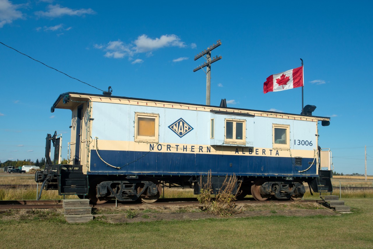 This fine looking Northern Alberta Railway caboose was built in 1926. It is now on display in Rycroft Alberta. The track in the background is CN's Rycroft Spur (formerly the NAR Smoky Sub)