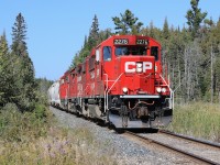 T06 has almost completed the journey from the mines at Nephton and Blue Mountain and will soon arrive at the yard in Havelock with 21 hoppers loaded with nepheline syenite.  The 20 mile Nephton Sub was built in 1954 to provide a rail connection between the mines and CP's mainline at Havelock.