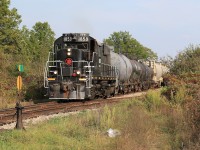 After spending the day working in Port Colborne and south Welland, 1859 pulls 25 cars through WH Yard and on towards Feeder Yard where the cars will be dropped off.  