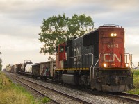 Rural small towns like Northwood have always been intriguing to me. Although they don't contain as much railway history like some of Ontario's larger towns or cities, it's these types of communities that most residents can recall what it was like in an era that 'once was'. Here, modern day CN 5643 runs long hood forward with a smaller version of train 438.