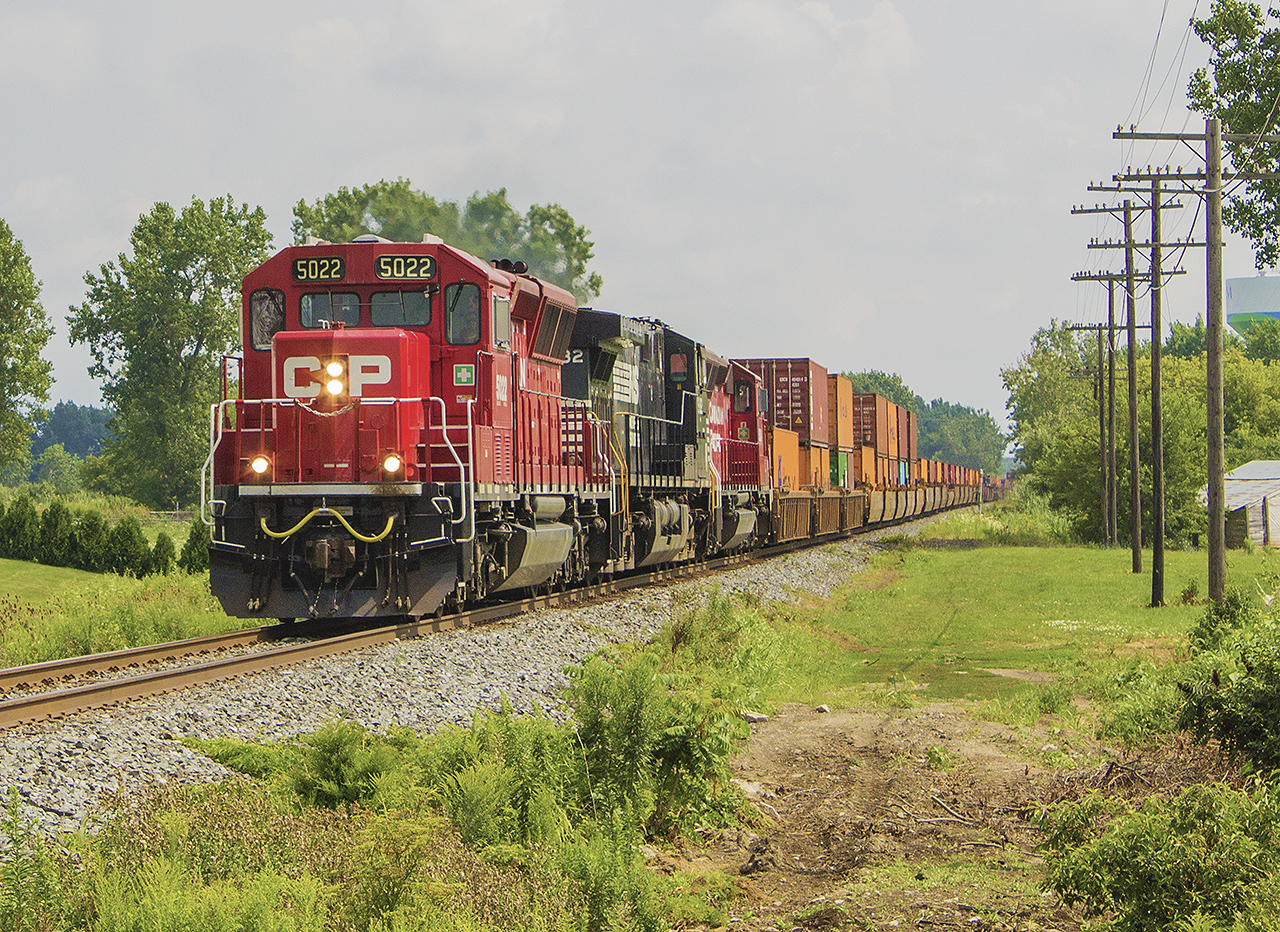 My "stay-cation" of 2017 was nicely filled with time to do some railfanning, without my usual sidekick. A few weeks before, there was some intriguing foreign power seen within Southwestern Ontario. Thankfully, it continued through out the time I had off. Here, a nice combination of smaller CP power led by 5022, with Norfolk Southern 9182 trailing ahead of an unidentified third CP unit.