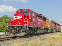 A great start to my vacation. Such colourful consists on the Canadian Pacific. This train with a BNSF sandwiched in between two CP locos led by 5031, at Tilbury.